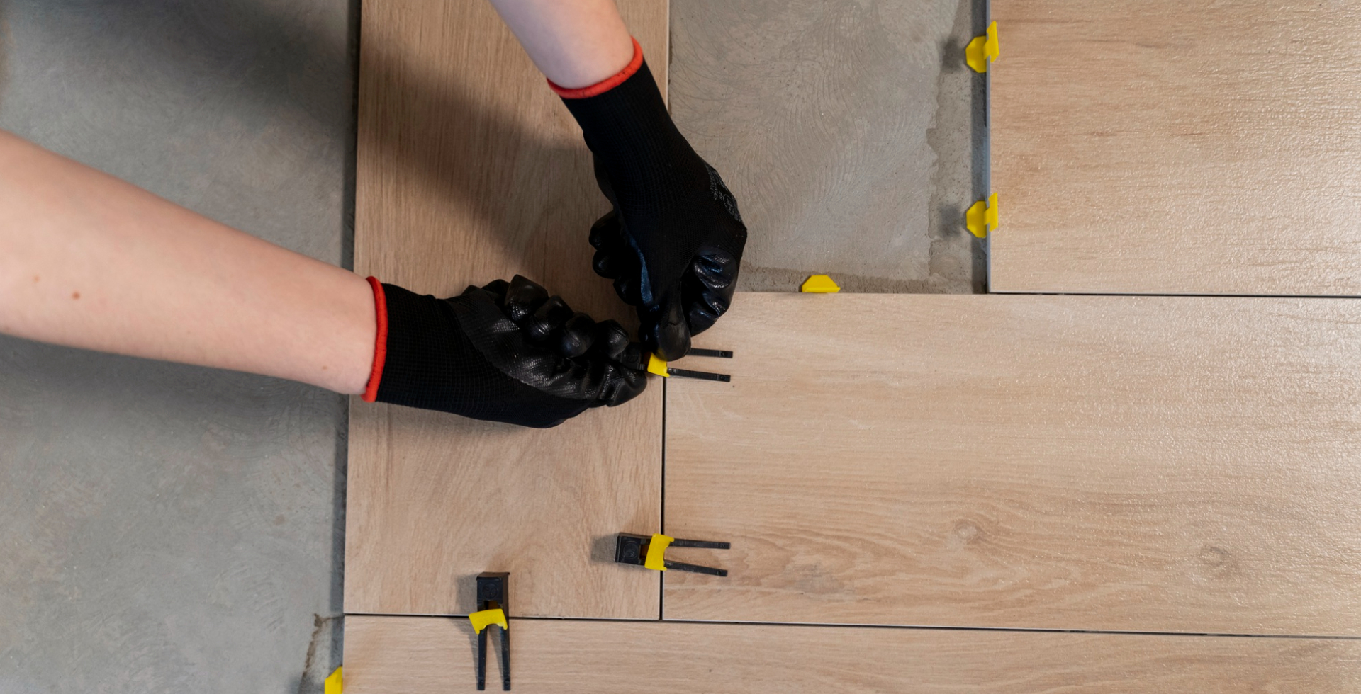 Flooring professional installing engineered hardwood flooring